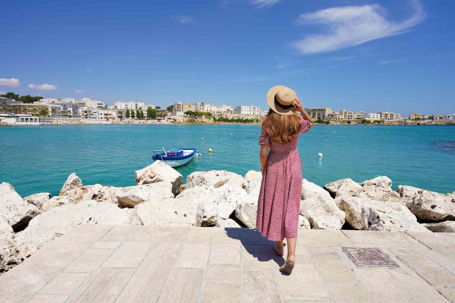 beautiful-woman-walking-towards-otranto-bay-admiring-panoramic-apulia-italy (1).jpg